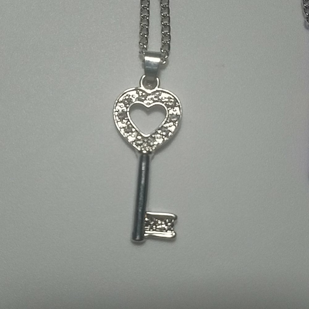 Silver necklace key